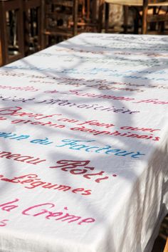 the table is covered with colorful writing on it