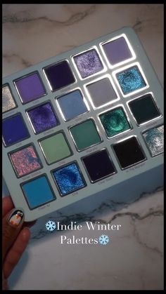 Smita Holden on Instagram: "❄️RECENT INDIE HOLIDAY PALETTES❄️ Some of this year’s indie makeup holiday palettes ❄️❄️❄️. Which is your favorite/on your wishlist? @cosmic_brushes @bellabeautebar @ensleyreign_cosmetics @viseart ✨CODE TO SAVE : GLAMSMITTY *giftef #viralmakeup #viralreels #trendingmakeup #etherealmakeup #barbiemakeup #sparklymakeup #makeuptextures #sparklyeyeshadow" Winter Eyeshadow Palette, Indie Eyeshadow Palette, Indie Eyeshadow, Unique Eyeshadow Palette, Makeup Palette Aesthetic, Palette Makeup, Glitter Palette, Makeup Palettes, Makeup Things