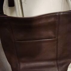 Brown Leather Handbag Has Pocket On Front And The Name Tag On One Side..The Inside Is Very Neat With Stamp Of Coach From The Old Days..May Have Some Scuff Marks That Are Hardly Noticeable..But This Bag Cam Be Redyed & Come Out Looking Brand New...But Overall Good Condition Classic Shoulder Bag With Snap Closure For Errands, Coach Satchel With Snap Closure, Coach Rectangular Shoulder Bag With Snap Closure, Coach Shoulder Bag With Leather Lining For Shopping, Coach Brown Leather Bucket Bag, Coach Bucket Shoulder Bag For Travel, Coach Shoulder Bag With Snap Closure, Coach Rectangular Bag With Snap Closure, Coach Tan Shoulder Bag For Travel