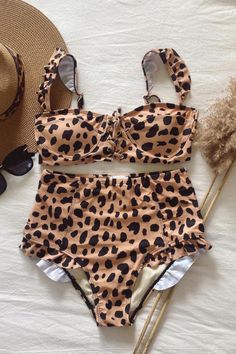 This printed bathing suit features a high waisted ruffle bottom with moderate coverage and a ruffle sleeve tie front top. Straps are adjustable for a comfortable fit. Swim Season, Top Straps, Tie Front Top, Print Swimsuit, Front Tie Top, Low Back, Bathing Suit, One Piece Swimsuit, Bathing Suits