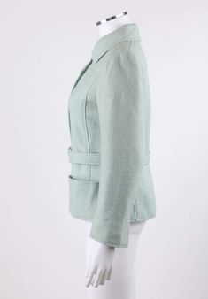 For Sale on 1stdibs - DESCRIPTION: COURREGES Hyperbole c.1970's Sky / Mint Blue Snap Front Belted Jacket Circa: c.1970’s Label(s): Courreges Hyperbole Designer: Andre Courreges Vintage Tweed Long Sleeve Jacket, Retro Long Sleeve Tweed Jacket For Spring, Vintage Single-breasted Tweed Jacket For Spring, Vintage Formal Tweed Jacket For Spring, Vintage Tailored Tweed Jacket For Spring, Spring Vintage Tailored Tweed Jacket, Tailored Vintage Tweed Jacket For Spring, 1970s Fitted Winter Outerwear, Tailored Retro Outerwear For Office