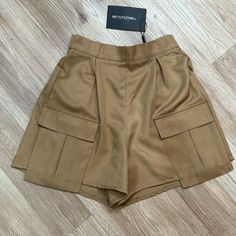 Pretty Little Thing Camel Khaki High Waist Cargo Shorts Size 2 Nwt. New With Tags. No Flaws. Smoke Free Home. Neutral Workwear Shorts With Pockets, Neutral Shorts With Pockets, Neutral High-waisted Shorts With Pockets, Brown Summer Cargo Shorts With Side Pockets, Neutral Shorts With Pockets For Day Out, Short Cargo Bottoms For Workwear, Brown Summer Cargo Shorts, Summer Cargo Style Shorts For Workwear, Brown Cargo Shorts For Summer