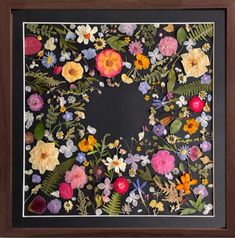 an image of a painting with flowers on it