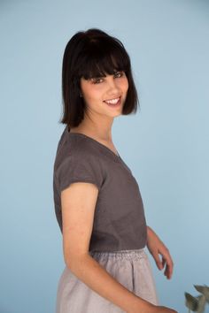 MsWrinkle’s clothing – from human to human.  100% handmade.*Description*- Simple linen top with short sleeves, V neckline and seam on the front and back;- High quality European linen;- Washed and softened (doesn't shrink anymore);- Medium weight linen (150 g/m2);- Our linen is OEKO-TEX certified that meets human ecological safety requirements;- Model is wearing size S in dark brown, elephant grey, white, sky blue and greenish mustard (other sizes and colors please choose on the right);- Not tran Cotton V-neck Summer Top, V-neck Cotton Top For Summer, Casual V-neck Fitted Top, Versatile Cotton V-neck Tops, Summer V-neck Fitted Blouse, Relaxed Fit Short Sleeve V-neck Top For Summer, Fitted Cotton V-neck Blouse, Summer Fitted V-neck Blouse, Fitted V-neck Cotton Blouse