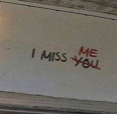 graffiti on the side of a building that says i miss you with red spray paint