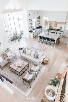 an aerial view of a living room and kitchen