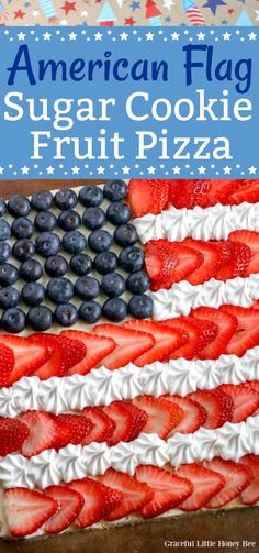 an american flag sugar cookie fruit pizza with strawberries and blueberries in the middle