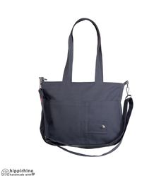 This canvas shoulder bag is a versatile and practical accessory for everyday wear. Made with durable canvas and features a spacious main compartment and adjustable crossbody strap. Perfect for both casual and formal occasions, it can easily hold all your essentials. Don't hesitate to contact us for customization and embroidery options. HOW TO ORDER DIFFERENT COLORS: -Visit my current fabric color list web page. Exterior and interior fabrics are listed separately  https://hippirhino.com/colors/ - Functional Shoulder Bag With Adjustable Handle For Everyday Use, Functional Canvas Crossbody Bag For On-the-go, Canvas Hobo Bag With Zipper Pocket For Everyday, Canvas Satchel Shoulder Bag With Zipper Pocket, Functional Everyday Crossbody Canvas Bag, Functional Cotton Shoulder Bag For Everyday Use, Canvas Bag With Removable Pouch For Everyday Use, Canvas Crossbody Shoulder Bag For Everyday Use, Everyday Canvas Crossbody Shoulder Bag