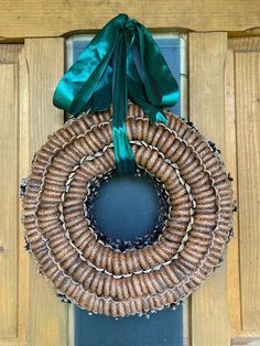 a wreath is hanging on the front door