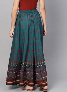 Look trendy and feminine by wearing this skirt for women from VitansEthnics. Made from premium fabric, this skirt has a very catchy design. Teal blue and red printed mid-rise flared maxi skirt with gathered detail, has an elasticated waistband with a drawstring fastening, flared hem.Material: 100% RayonSizes: To Fit Waist(in inches): 26, 28, 30, 32, 34, 36Skirt Length: 40inchesLining: No LiningPattern: PrintedStyle: Lehenga Skirt For Women, Maxi Skirt, Pure Cotton SkirtWash Care: Machine WashDis Flare Maxi Skirt, Indian Skirt, Lehenga Skirt, Skirt For Women, Women Maxi, Cotton Skirt, Teal Blue, Skirt Length, Fashion Prints