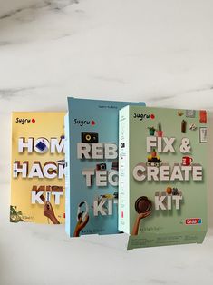 three books on how to create kits for children's crafts are shown in front of a marble background