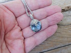 "Blue topaz necklace...1 1/4\" tall with bail by 3/4\" wide at the widest spot, cast in sterling silver 925 with a beautiful 18mm by 16mm checkerboard cut Sky blue topaz stone...the chain is 19\" with a lobster catch also in sterling silver 925...beautiful detailed necklace" Nickel-free Blue Topaz Jewelry, Silver Oval Pendant Jewelry With Blue Topaz, Silver Oval Blue Topaz Pendant Jewelry, Handmade Silver Blue Topaz Necklace, Silver Blue Topaz Oval Pendant Jewelry, Handmade Blue Topaz Pendant Jewelry, Topaz Jewelry With Large Stone For Gift, Handmade Light Blue Sterling Silver Necklace, Handmade Light Blue Sterling Silver Necklaces