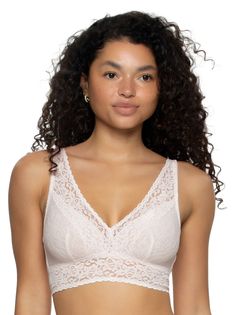 Comfortable enough to wear every day but pretty enough to be worn out - all the things you look for in a bra come together in this chic lace bralette. The longline design features a plunging, scallop-edged neckline, all-over lace cups and wings with a liner of rayon jersey for the right amount of coverage all the while keeping you cool and comfortable. Feminine Lace With Built-in Bra, Bra Friendly Lace Camisole, Delicate Lace Low-cut Feminine Bra, Feminine Delicate Lace Low-cut Bra, Lace Camisole Bra With Lace Top, Lace Camisole Top Bra, Seamless Lace Top, Chic Lace Bra With Lace Trim, Elegant Lace Bra With Lace Top