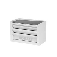 the kobalt drawer is white and has three drawers on each side, one for storing items