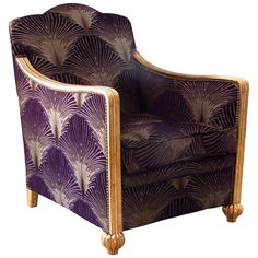 a purple and gold chair sitting on top of a white floor