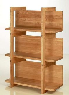 a wooden book shelf with three shelves on each side and one section missing from the top