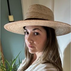 Stay Cool And Stylish With This Wide Brim Fedora. Made With Natural Palm Leaves, Crafted By Skilled Artisans From Mexico. Color: Natural. Band Color: Dark Brown One Size (Elastic Band Inside) Crown 5” + 3.7” Wide Flat Brim Made In Mexico. Material: Natural Palm Leaf Imported. Wide Brim Fedora, Palm Leaf, Palm Leaves, Stay Cool, Wide Brimmed, Elastic Band, Fedora, Dark Brown, Style Me