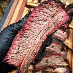 the steak is being cooked on the grill