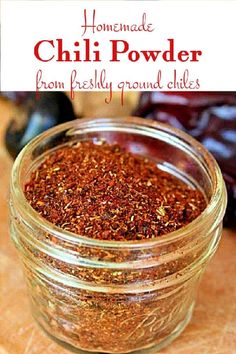 homemade chili powder in a glass jar with text overlay that reads homemade chili powder from freshly ground chiles