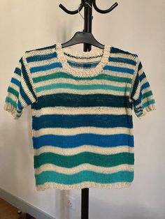 Summer sweater, in natural cotton, blue and green/ecru stripes. Short sleeves. Round neckline. Size S (38). Other colors or sizes on order. Knit Crew Neck Sweater With Horizontal Stripes, Knit Sweater With Horizontal Stripes And Crew Neck, Striped Cotton Crew Neck Sweater, Striped Cotton Crew Neck Knit Top, Crew Neck Cotton Knitted Top, Crew Neck Cotton Knit Top, Striped Cotton Knit Top With Crew Neck, Knitted Cotton Crew Neck Top, Striped Knitted Cotton Top