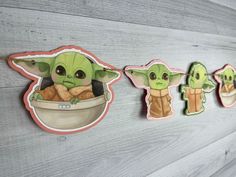 star wars baby yoda stickers hanging on a wall