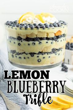 lemon blueberry trifle in a glass dish with the title overlay reading lemon blueberry trifle