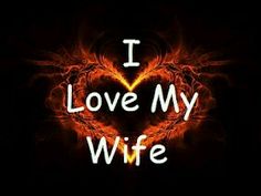 the words i love my wife written in white on a black background with an orange heart