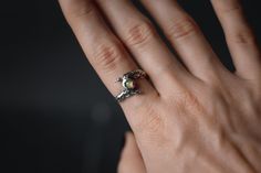 This unique ring with opal was inspired by nature's texture and witchy vibes. It is one of a kind piece which makes it even more unique. The ring was casted from sterling silver 925 and oxidized to get the black shadow. You can choose a natural stone for the ring: opal, peridot, sunstone, rutilated quartz, moonstone, labradorite, tourmalinated quartz and aventurine. Please note that every ring is an unique piece made by hand, therefore there might be slight differences in a pattern and stone. ⟢ Witchy Rings, Unique Opal, Mystical Jewelry, Silver Handmade Jewelry, Rings Sterling Silver, Tourmalinated Quartz, Ring Opal, Black Shadow, Sterling Silver Jewelry Handmade