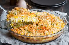 a casserole dish filled with corn and cheese