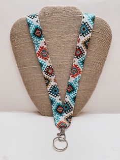 Handcrafted from 100% cotton fabric in western or Aztec patterns, colorful. Comes with lanyard clip and ring. Approximate length is 35 inches from end to end. What's special about our lanyards? They lay down and don't rollover! We can't wait to hug your neck! Follow @LANYARD365 on facebook and instagram for updates and coupon codes.  Favorite my shop to be notified each time I add a new product. Adjustable Multicolor Bohemian Lanyards, Casual Adjustable Multicolor Lanyards, Bohemian Adjustable Lanyards For Everyday Use, Patterns Colorful, Aztec Pattern, Hug You, Badge Holders Lanyard, Coupon Codes, Lanyard