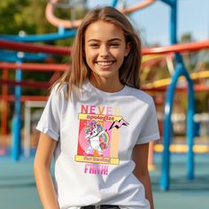 "Kids will love this 80's Unicorn Shirt.  It is a perfect way to show off your faith and style! This cute shirt features a fun, mystical unicorn design with the phrase \"Never Apologize for Having Faith\" - reminding everyone of the power of faith. The colors are vibrant and bold, the words add a touch of positive energy.  No matter the reasons why you choose to wear it, this 80's Unicorn Shirt will always make you feel connected to your faith and remind you to keep believing. Show off your beli Cute White Shirt For Fan Merchandise, Unisex Fun Graphic Print Shirt, Fun Screen Printed Shirt For Fan Merchandise, Fun Screen Print Shirt For Fans, Fun Screen Print Shirt For Fan Merchandise, Fan Merchandise Fun Graphic Print Shirt, Fun Funny Print Shirt, Playful Pre-shrunk Tops For Streetwear, Funny Graphic Print School Shirt