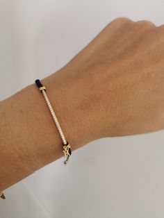 W H A T ∙ M A K E S ∙ T H I S ∙ S P E C I A L This beautiful CZ BAR bracelet adjusts to fit different wrist sizes. This dainty bracelet looks gorgeous stacked with other bracelets and watch. Simple, delicate and versatile... you'll want in your collection. - we use only the finest quality materials - all components are 100% sterling silver or 18k Gold plated (Nickel free) - all pieces are designed in our happy studio D E T A I L S * Available in sterling silver or Crafted in Gold plated .925 ste Luxury Adjustable Cord Jewelry As Gift, Adjustable Sterling Silver Diamond Bracelet For Everyday, Everyday Jewelry Bracelet With Adjustable Cord, Everyday Adjustable Cord Bracelet Jewelry, Everyday Adjustable Cord Bracelet, Classic Adjustable Diamond Bracelet For Gift, Classic Adjustable Diamond Bracelet As Gift, Adjustable White Gold Diamond Bracelet For Everyday, Classic Jewelry With Adjustable Cord As A Gift