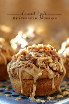 a close up of a muffin on a plate with caramel drizzle