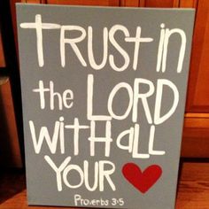 a sign that says trust in the lord with all your heart