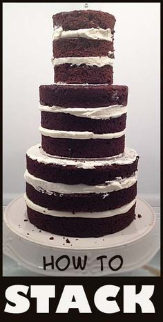 a cake with white frosting on top and the words how to stack