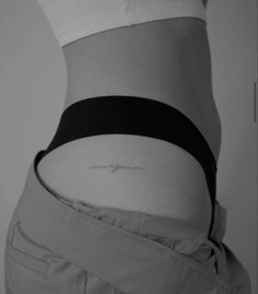 a woman's stomach with the word love written on it