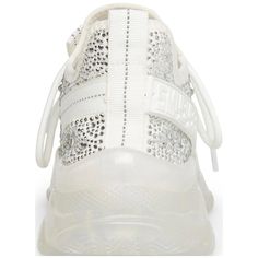 Glam up your activewear with these sparkling Maxima trainers from Steve Madden. Rhinestone trim adds just the right amount of bling to the athletic knit upper and chunky sole, elevating this sneaker from ordinary to Instagram-worthy. The stabilizing 1' hidden platform and 1-3/4' heel allow for comfort with a boost of height, perfect for strutting your stuff everywhere from brunch to the gym. Subtle day-to-night style is effortless in this versatile knit fabrication that works just as well with l Sporty Sneakers With Glitter Accents, White Synthetic Sneakers With Bling, Sporty High-top Sneakers With Rhinestones, Sporty Low-top Rhinestone Sneakers, Sporty Low-top Sneakers With Rhinestones, Sporty Embellished Lace-up Sneakers, Sporty Low-top Bling Sneakers, Sporty Embellished Sneakers, Sporty White Sneakers With Rhinestones