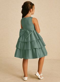 Cupcake features a sweet A-line silhouette in matte satin, accented with a delightful scoop neckline and playful bows. Its sleeveless design adds a cheerful touch, making it an adorable choice for any special occasion. Tea Length Flower Girl Dress, Sage Dress, Military Ball Dresses, Special Event Dresses, Lace Bride, Ivory Dresses, Lace Dress Black, Black Wedding Dresses, Ball Gown Dresses