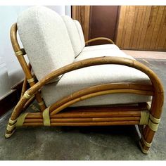 a chair made out of bamboo and fabric