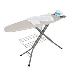 an ironing board with clothes on it