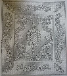 an intricately designed piece of paper with flowers and leaves on it's sides