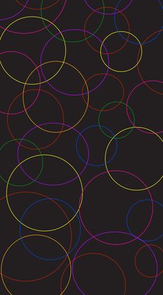 a black background with multicolored circles on it