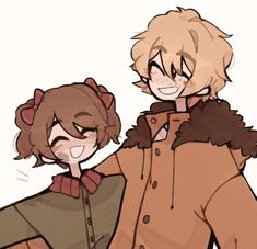 two people are standing next to each other with their arms around one another, both wearing brown coats