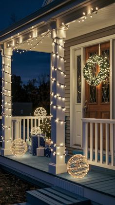 a porch covered in christmas lights and decorations