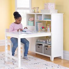 Create a bridge between living and learning spaces with stylish furniture from Martha Stewart and Guidecraft. Use the unique Kids' Media System with Desk Extension, to create a flexible, organized and personalized study space for your child. This versatile desk and chair set features plenty of open storage, making it the perfect addition to any child's bedroom, playroom or home-learning environment. The large workspace and accessible shelving keeps children organized and focused, with everything Wooden Cubby Storage, Computer Study Table, Desk Extension, Computer Study, Kids Art Table, Wooden Cubby, Desk Solutions, Childrens Desk, Fabric Storage Bins