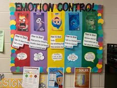 a bulletin board with posters on it that say emotion control