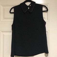 Very Nice Elodie Black Collar Sleeveless Top. The Collar Has A Nice Gunmetal Chain Like Detail, Pictured Above. Key Hole Detail With A Gunmetal Color Button In The Back. Size: L Pit To Pit: Approx 18” Sleeve Opening: Approx 8.5” Length: Approx 23.5” Excellent Condition. Please Refer To Pictures. Sleeveless Top, Collar, Womens Tops, Tank Tops, Women's Top, Women Shopping, Black, Color