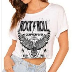 These Cropped Tees Are Awesome. They Are Oversized, So They Will Fit A Little Large. They Are White Quality Fabric, With Nice Quality Graphic Design In Black, And They Come In Small Medium Large. Rock And Roll Graphic Print Tops For Spring, Rock And Roll Graphic Print Spring Tops, Spring Rock And Roll Tops With Graphic Print, White Crew Neck Rock Style Tops, White Short Sleeve Rocker Tops, White Rocker Style Short Sleeve Tops, White Graphic Print Rocker Tops, White Graphic Print Rock And Roll Top, White Rock And Roll Graphic Print Top