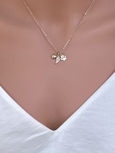 14k solid gold Angle wing , paw print & heart necklace. The best gift for Pet lover necklace . All components onto 14k solid gold . it consists of .. -14k Solid Gold 10.2 x 8.7mm Paw print charm , 14.5 x 5.3mm Angle wing charm and 11.3 x 6.3mm little puff heart are attached onto -14k Solid yellow gold baby Box chain or Cable chain or Rope chain , -Come up with beautiful jewelry gift box and -One set of Care instruction package . MORE Solid GOLD JEWELRY https://www.etsy.com/shop/rainbowearrin Elegant Engraved Charm Necklace For Best Friend, Heart Charm Jewelry For Best Friend Gift, Elegant Heart Charm Necklace For Best Friend, Elegant Heart Pendant Jewelry For Best Friend, Elegant Heart Pendant Necklace For Best Friend, Elegant Heart Pendant Charm Necklace For Best Friend, Elegant Heart Charm Jewelry For Best Friend Gift, Heart Pendant Jewelry Charms For Best Friend Gift, Tiny Paw Print