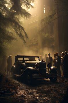 an old car parked in front of a group of people on a foggy street